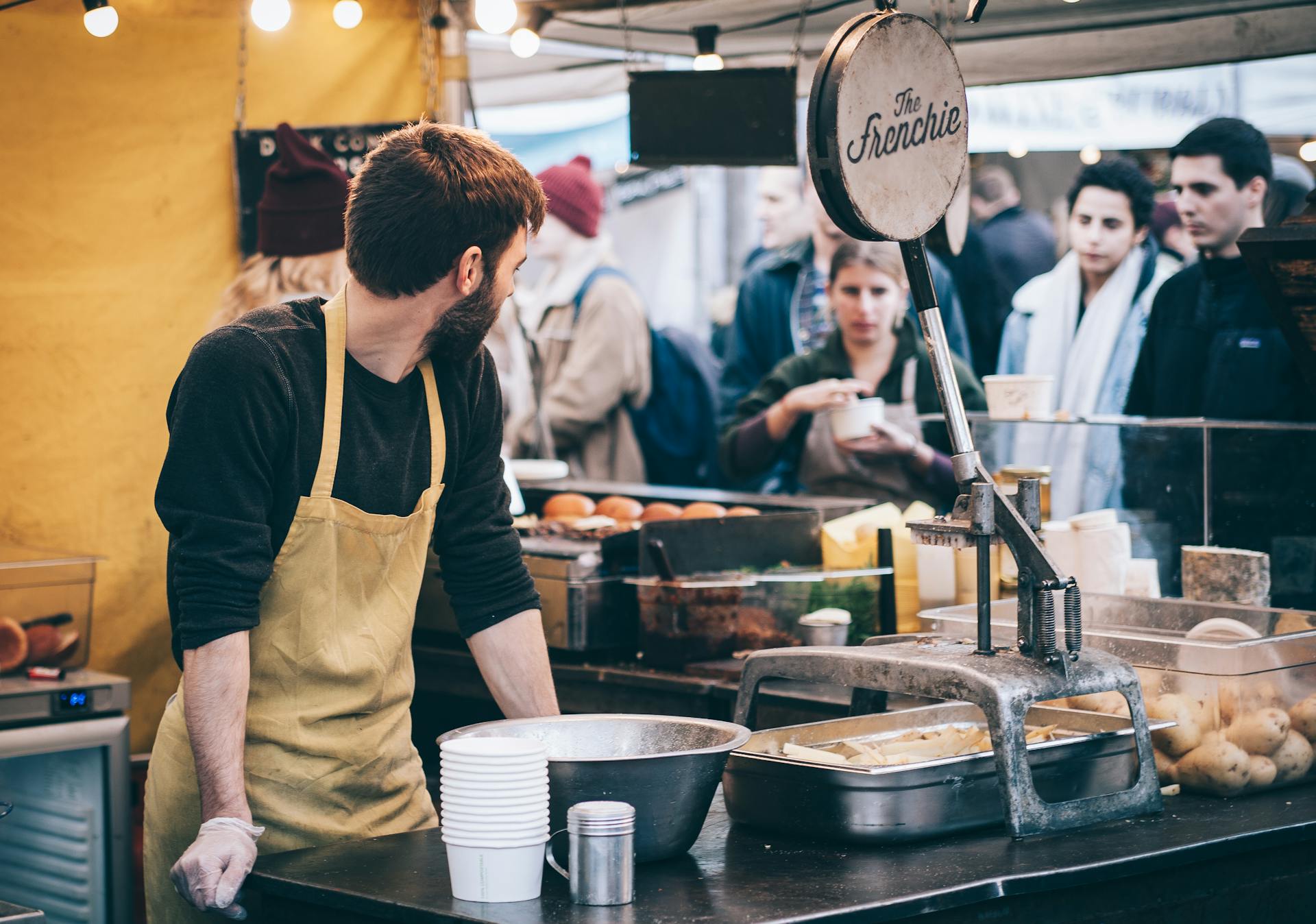 kitchen staff working - restaurant and hospitality bookkeeping