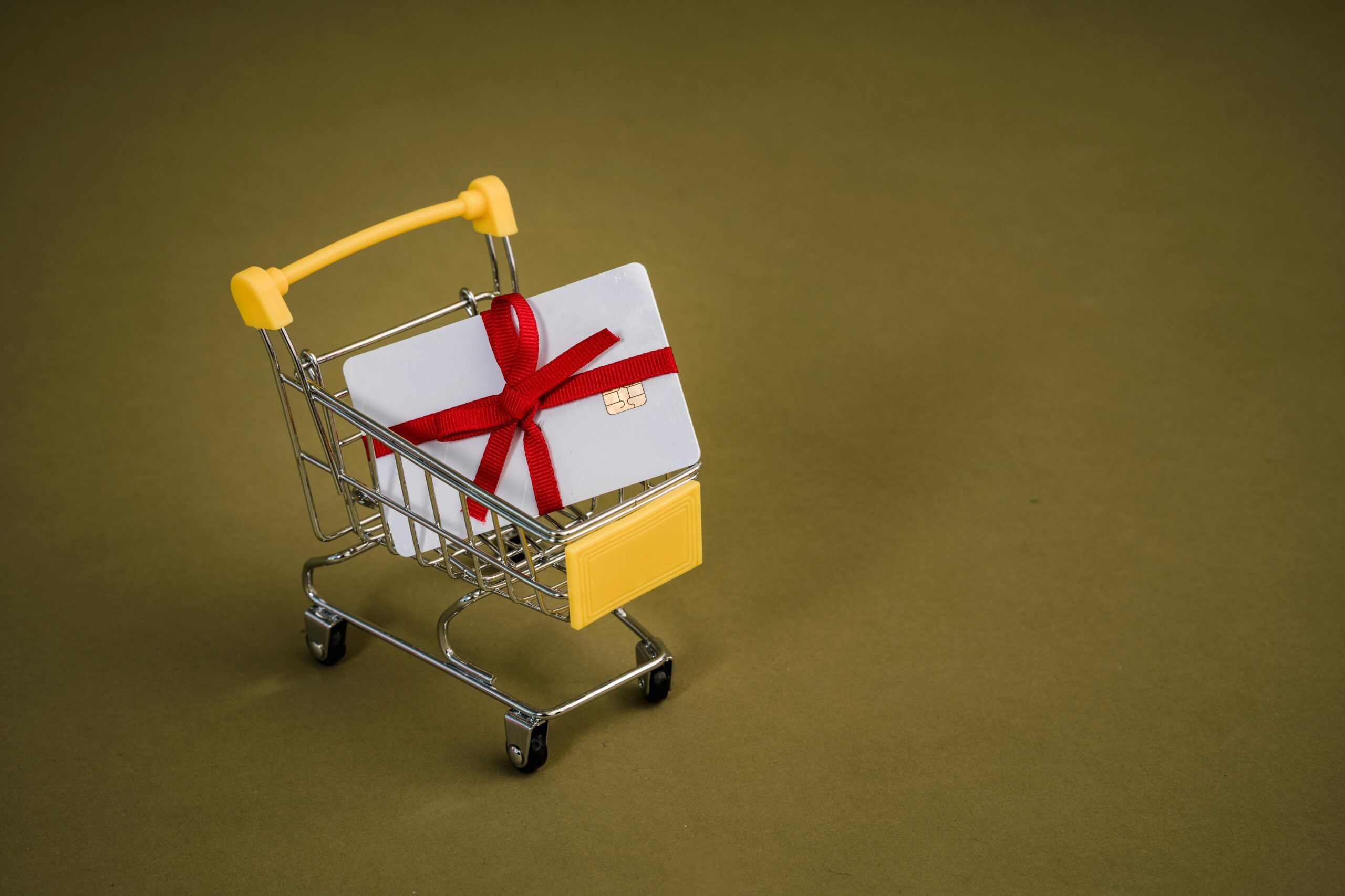 online shopping cart with gift wrapped credit card - buy now pay later?