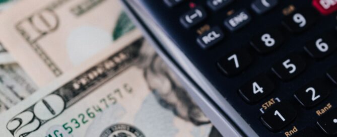 calculator and cash - we handle Quickbooks Payroll