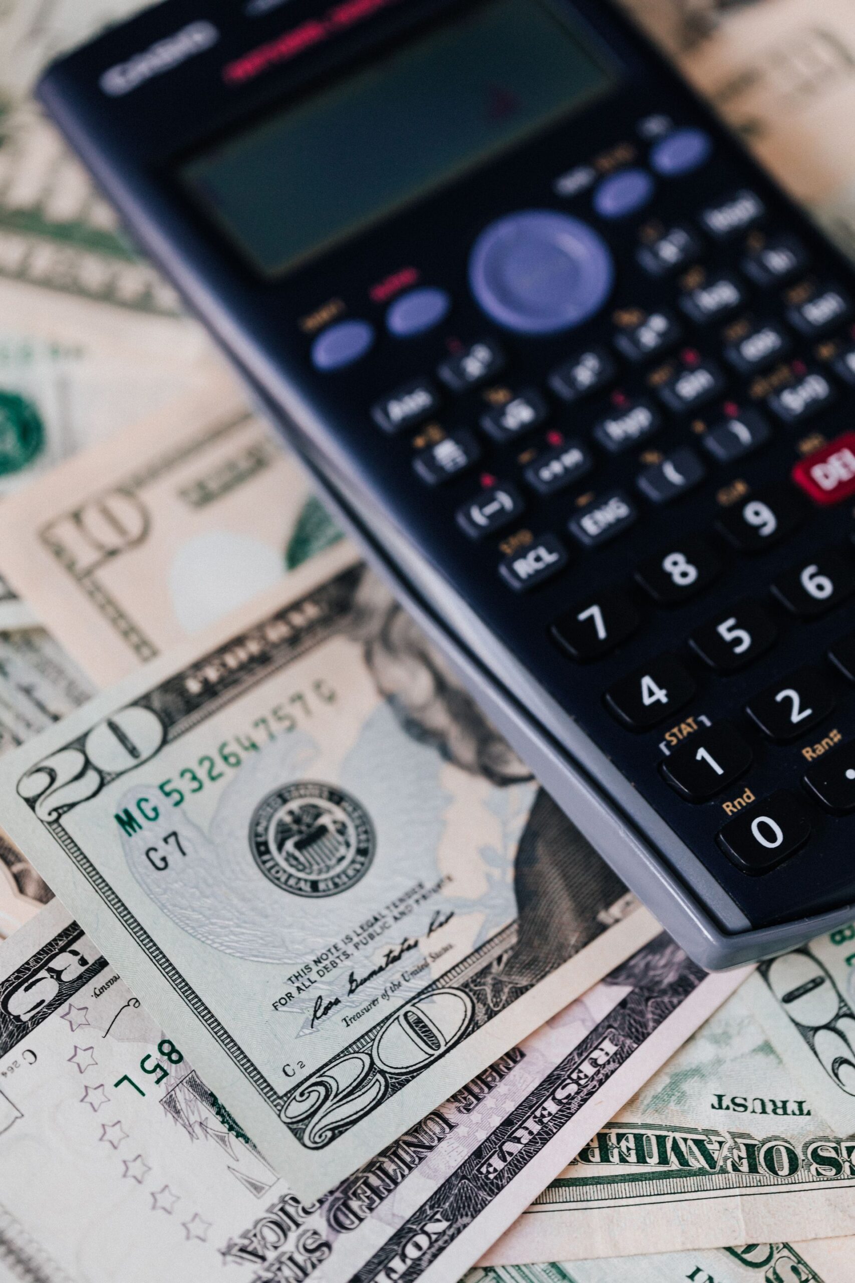calculator and cash - we handle Quickbooks Payroll